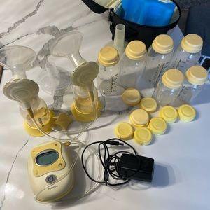 Medela Freestyle Pump and bottles